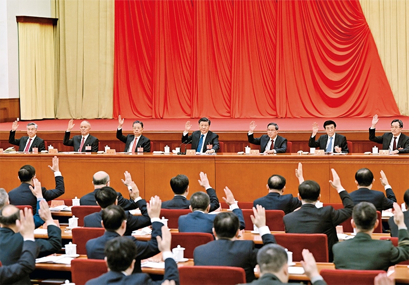 中國共產(chǎn)黨第二十屆中央委員會第二次全體會議，于2023年2月26日至28日在北京舉行。這是習(xí)近平、李強(qiáng)、趙樂際、王滬寧、蔡奇、丁薛祥、李希等在主席臺上。 新華社記者 謝環(huán)馳/攝