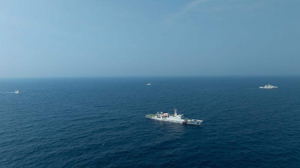 4月22日，中越海警艦艇編隊在北部灣海域開展聯(lián)合巡邏。（中國海警供圖）